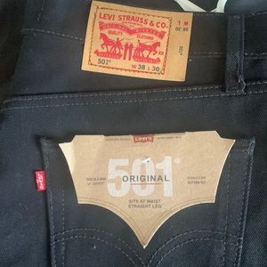 Levi’s 501 original straight leg, sits at waist, dark black